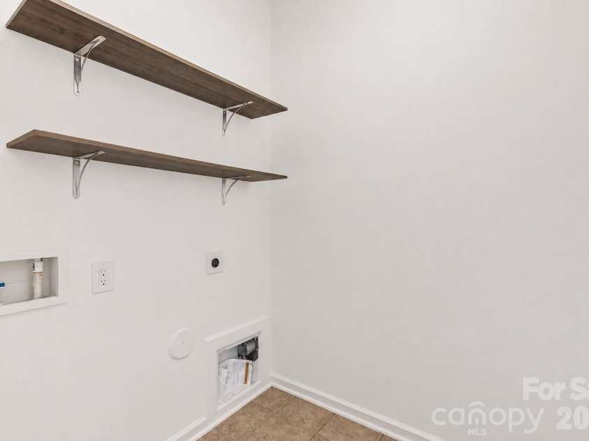 10563 Stoneacre Court, Pineville, NC 28134.  MLS# CAR4428184, YatesRealty ID 33537. Laundry Room - Main Level