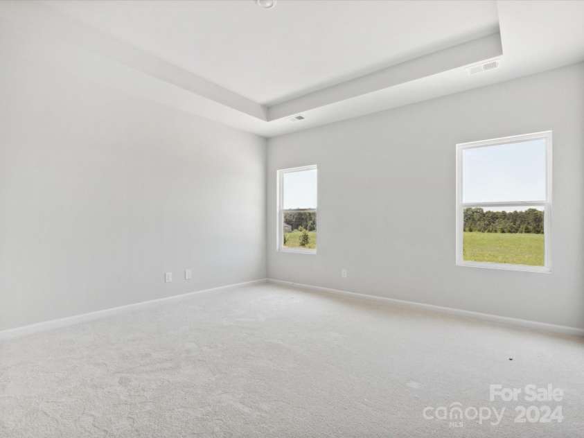 1035 Bull Dog Lane, Wingate, NC 28174.  MLS# CAR4163234, YatesRealty ID 3354. Primary Bedroom