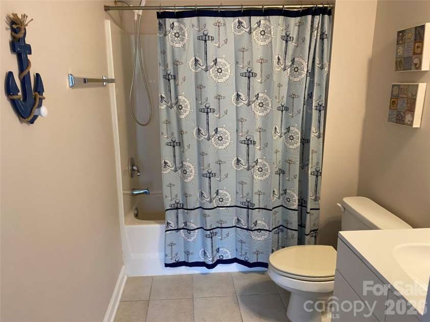 5825 Catalina Drive, North Myrtle Beach, SC 29582.  MLS# CAR4301398, YatesRealty ID 3354. En suite shower