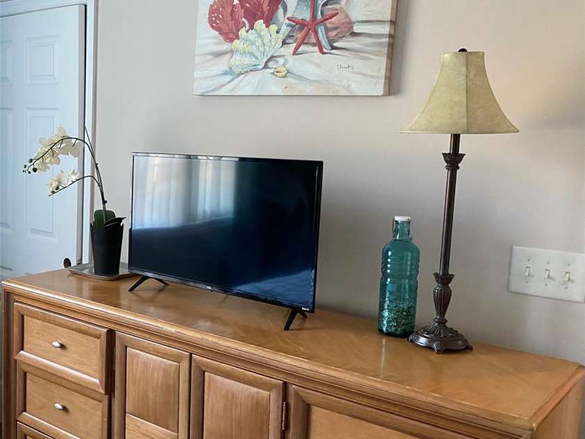 5825 Catalina Drive, North Myrtle Beach, SC 29582.  MLS# CAR4301398, YatesRealty ID 3354. Primary bedroom dresser