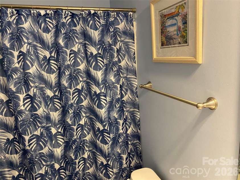 5825 Catalina Drive, North Myrtle Beach, SC 29582.  MLS# CAR4301398, YatesRealty ID 3354. Second bathroom shower
