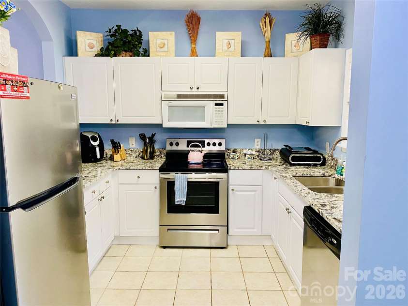 5825 Catalina Drive, North Myrtle Beach, SC 29582.  MLS# CAR4301398, YatesRealty ID 3354. Spacious fully stocked kitchen.