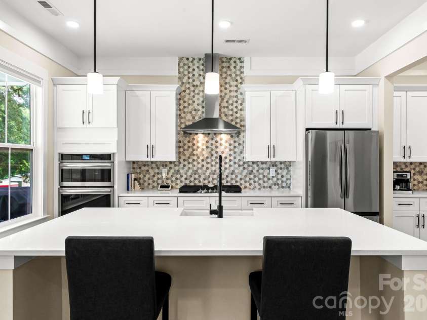 1002 Parkes Street, Matthews, NC 28105.  MLS# CAR4392484, YatesRealty ID 33541. 