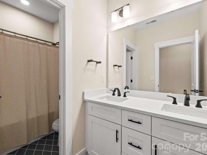 1002 Parkes Street, Matthews, NC 28105.  MLS# CAR4392484, YatesRealty ID 33541. 