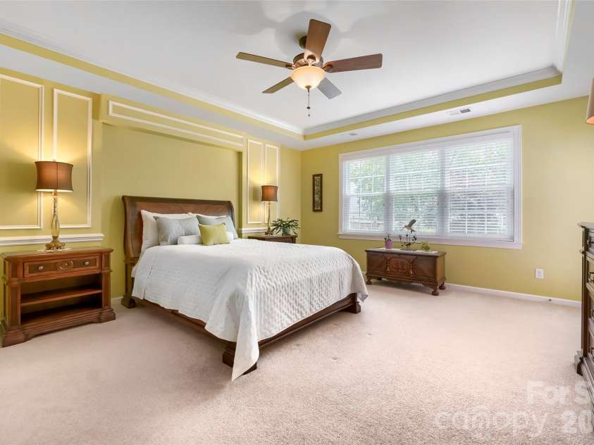 653 Lorain Avenue, Concord, NC 28027.  MLS# CAR4395412, YatesRealty ID 33548. Main Floor Primary Bedroom