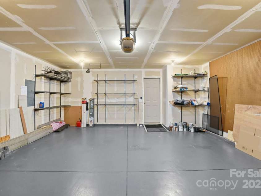 630 Springhouse Place, Clover, SC 29710.  MLS# CAR4278014, YatesRealty ID 3355. Shelves in Garage