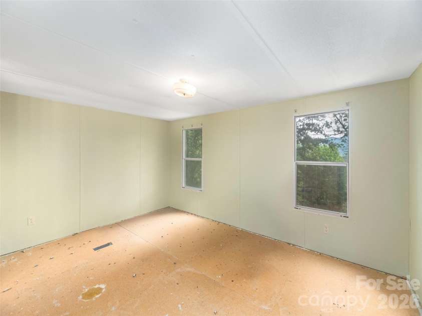 87 Holly Ridge Road, Candler, NC 28715.  MLS# CAR4397936, YatesRealty ID 33551. 