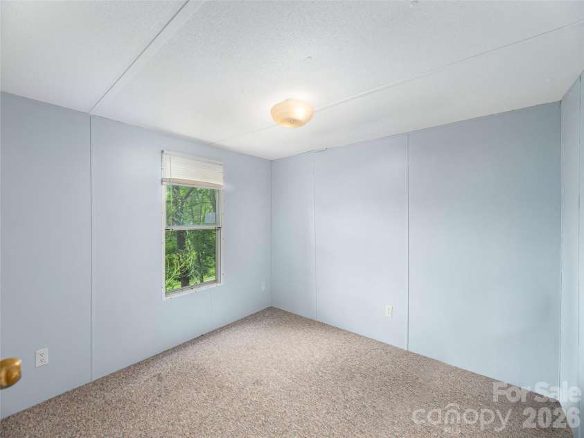 87 Holly Ridge Road, Candler, NC 28715.  MLS# CAR4397936, YatesRealty ID 33551. 