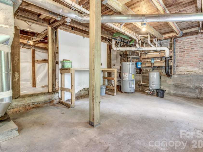 657 Old Fort Road, Fairview, NC 28730.  MLS# CAR4397979, YatesRealty ID 33555. Walk-out basement with workshop and storage space.