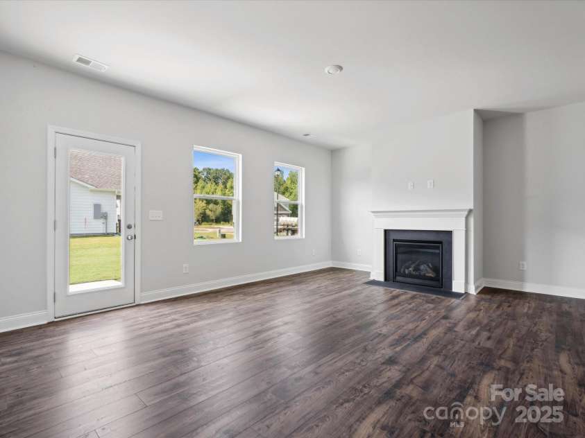 1051 Bull Dog Lane, Wingate, NC 28174.  MLS# CAR4183565, YatesRealty ID 3356. *Photo is for representational purposes only*family room