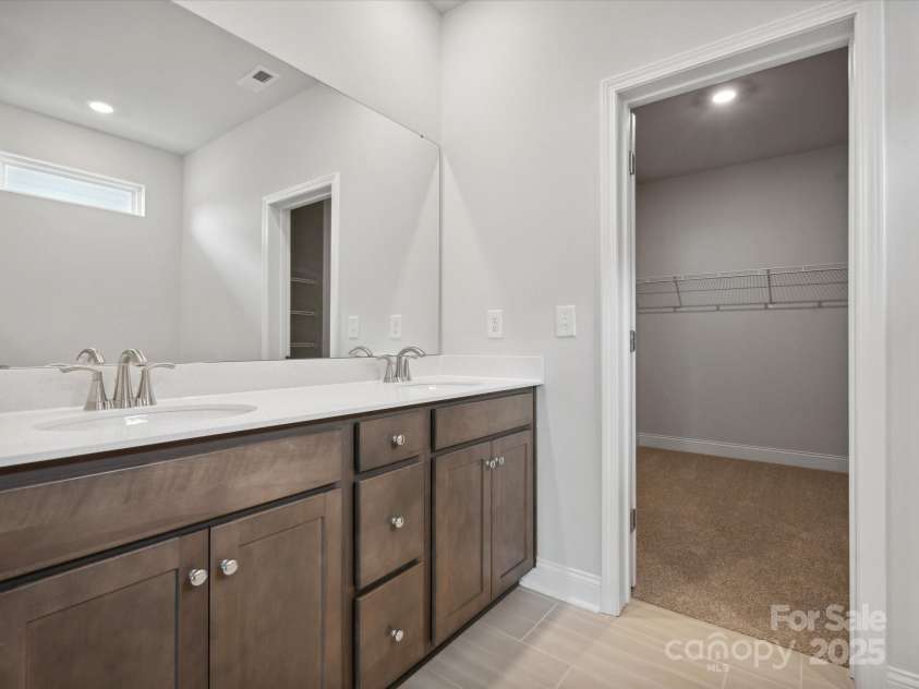 1051 Bull Dog Lane, Wingate, NC 28174.  MLS# CAR4183565, YatesRealty ID 3356. *Photo is for representational purposes only*Primary bath