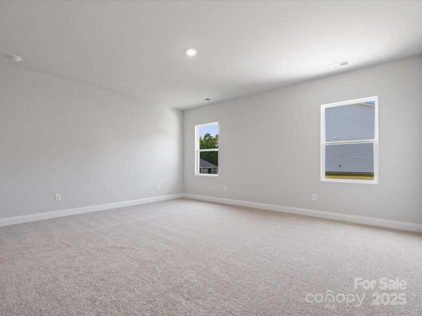 1051 Bull Dog Lane, Wingate, NC 28174.  MLS# CAR4183565, YatesRealty ID 3356. *Photo is for representational purposes only*Primary bedroom