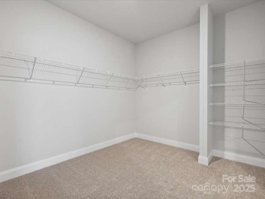 1051 Bull Dog Lane, Wingate, NC 28174.  MLS# CAR4183565, YatesRealty ID 3356. *Photo is for representational purposes only*Primary closet