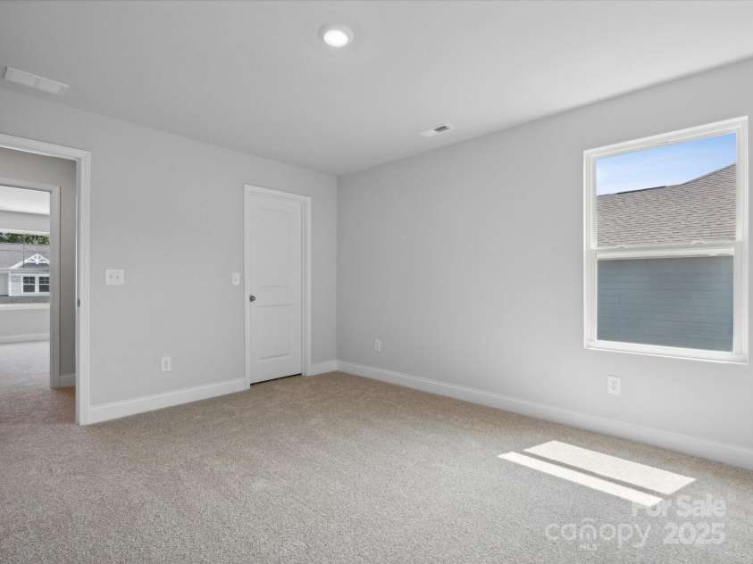 1051 Bull Dog Lane, Wingate, NC 28174.  MLS# CAR4183565, YatesRealty ID 3356. *Photo is for representational purposes only*secondary bedroom