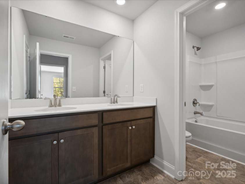 1051 Bull Dog Lane, Wingate, NC 28174.  MLS# CAR4183565, YatesRealty ID 3356. *Photo is for representational purposes only*Upstairs bath