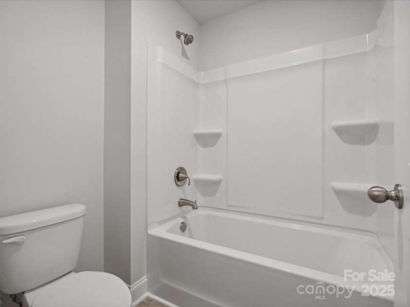 1051 Bull Dog Lane, Wingate, NC 28174.  MLS# CAR4183565, YatesRealty ID 3356. *Photo is for representational purposes only*Upstairs bath