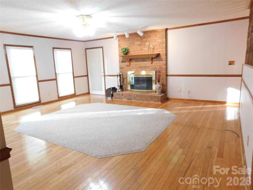 175 Briarfield Drive, Mooresville, NC 28115.  MLS# CAR4342091, YatesRealty ID 3356. Another view of great room showing ample space to walk through to the semi open dining room or kitchen