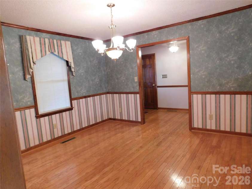 175 Briarfield Drive, Mooresville, NC 28115.  MLS# CAR4342091, YatesRealty ID 3356. Back inside and off the kitchen and foyer area the formal Dining room
