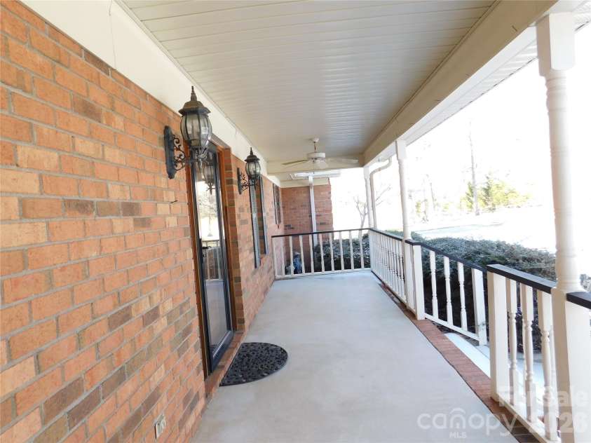 175 Briarfield Drive, Mooresville, NC 28115.  MLS# CAR4342091, YatesRealty ID 3356. Huge Covered Front porch concrete floor