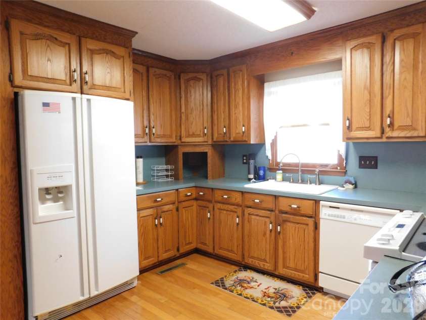 175 Briarfield Drive, Mooresville, NC 28115.  MLS# CAR4342091, YatesRealty ID 3356. Kitchen features Plenty of cabinets and built in bread box and lazy susan