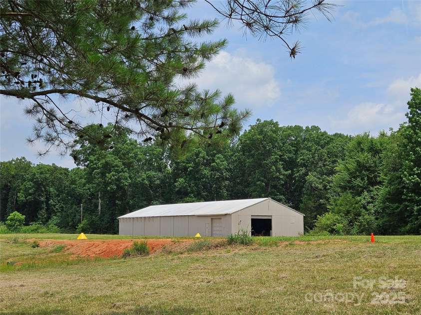 2905 Medlin Road, Monroe, NC 28112.  MLS# CAR4267802, YatesRealty ID 3356. Hanger has separate gate entry at Macedonia Church Rd