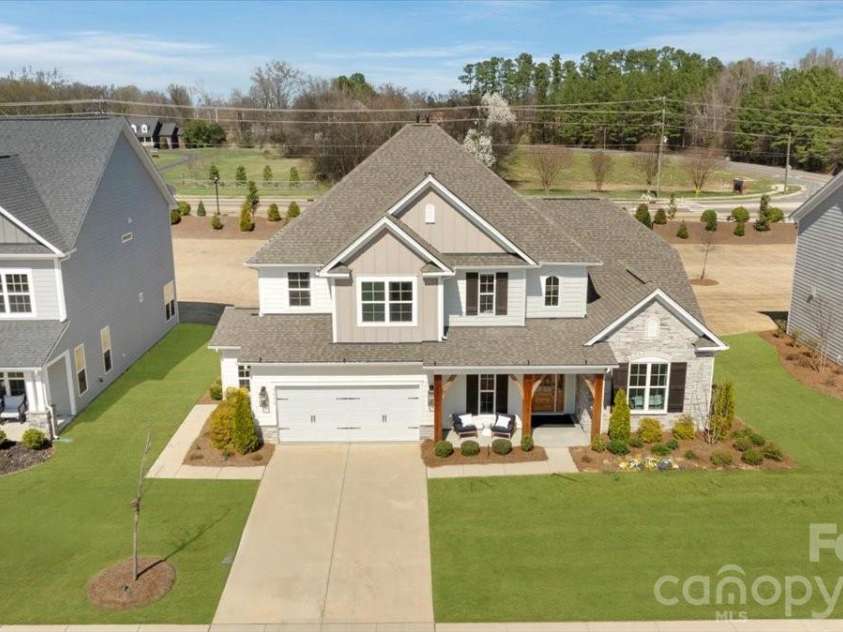 3814 Dahlia Drive, Harrisburg, NC 28075.  MLS# CAR4374497, YatesRealty ID 33560. Digitally enhanced lawn