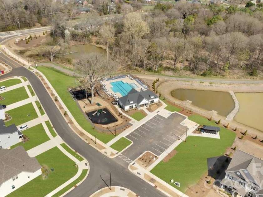 3814 Dahlia Drive, Harrisburg, NC 28075.  MLS# CAR4374497, YatesRealty ID 33560. Digitally enhanced lawn