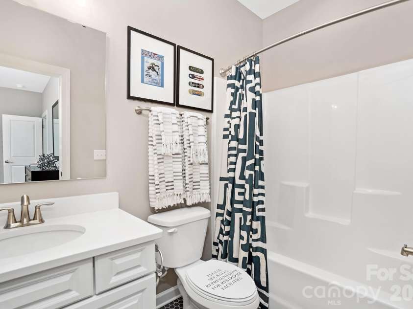 3814 Dahlia Drive, Harrisburg, NC 28075.  MLS# CAR4374497, YatesRealty ID 33560. Ensuite bathroom