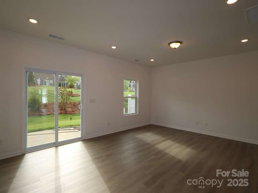 3208 Lilac Grove Drive, Charlotte, NC 28269.  MLS# CAR4294867, YatesRealty ID 33567. Family room