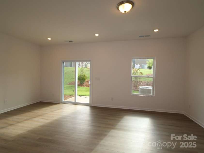 3208 Lilac Grove Drive, Charlotte, NC 28269.  MLS# CAR4294867, YatesRealty ID 33567. Family room