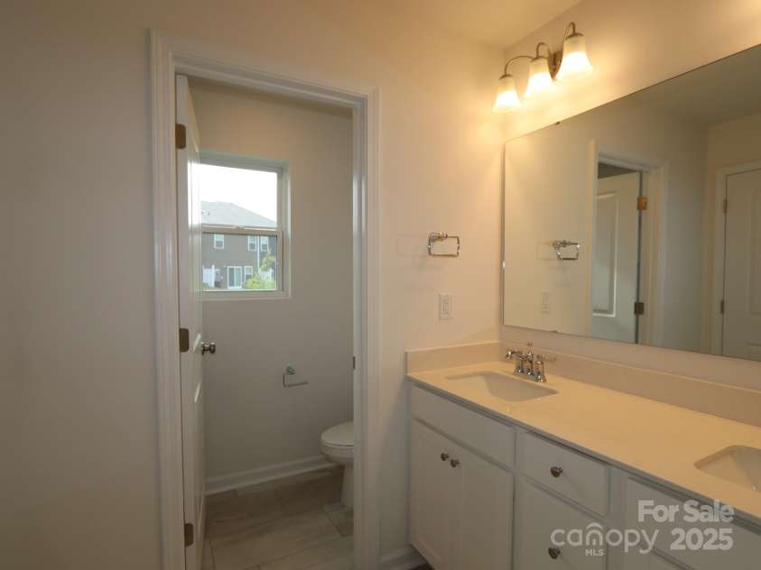 3208 Lilac Grove Drive, Charlotte, NC 28269.  MLS# CAR4294867, YatesRealty ID 33567. Owners bathroom