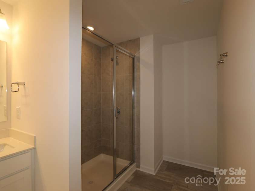 3208 Lilac Grove Drive, Charlotte, NC 28269.  MLS# CAR4294867, YatesRealty ID 33567. Owners bathroom