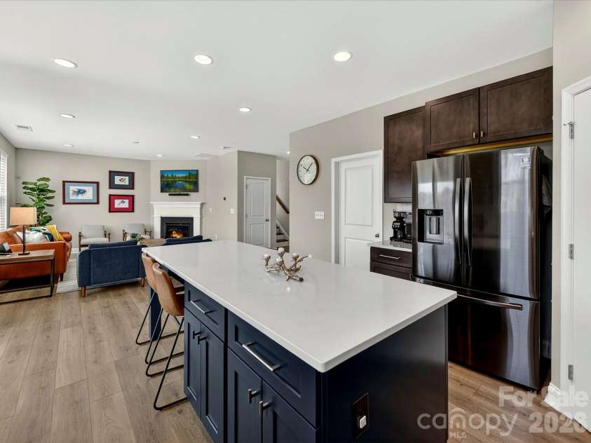 6203 Six String Court, Fort Mill, SC 29708.  MLS# CAR4385679, YatesRealty ID 33567. Island with Storage and Quartz Counters. Kitchen Refrigerator to Remain