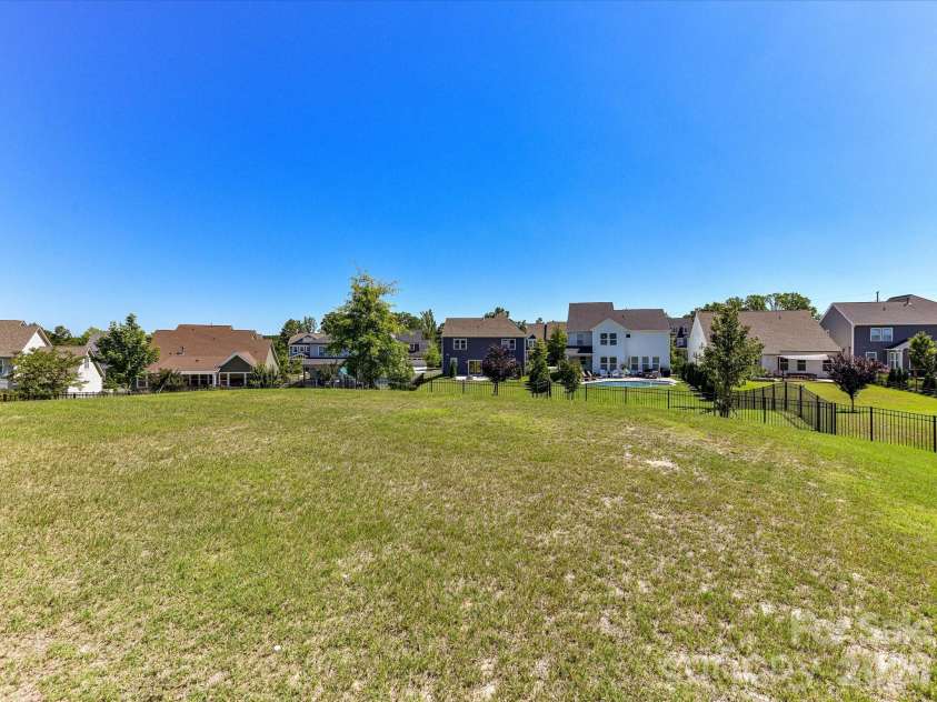 6203 Six String Court, Fort Mill, SC 29708.  MLS# CAR4385679, YatesRealty ID 33567. Large Fenced Backyard