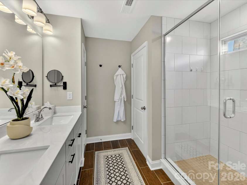 6203 Six String Court, Fort Mill, SC 29708.  MLS# CAR4385679, YatesRealty ID 33567. Primary Bath with Quartz Counters, Subway Tiled Flooring and Tiled Shower Surround