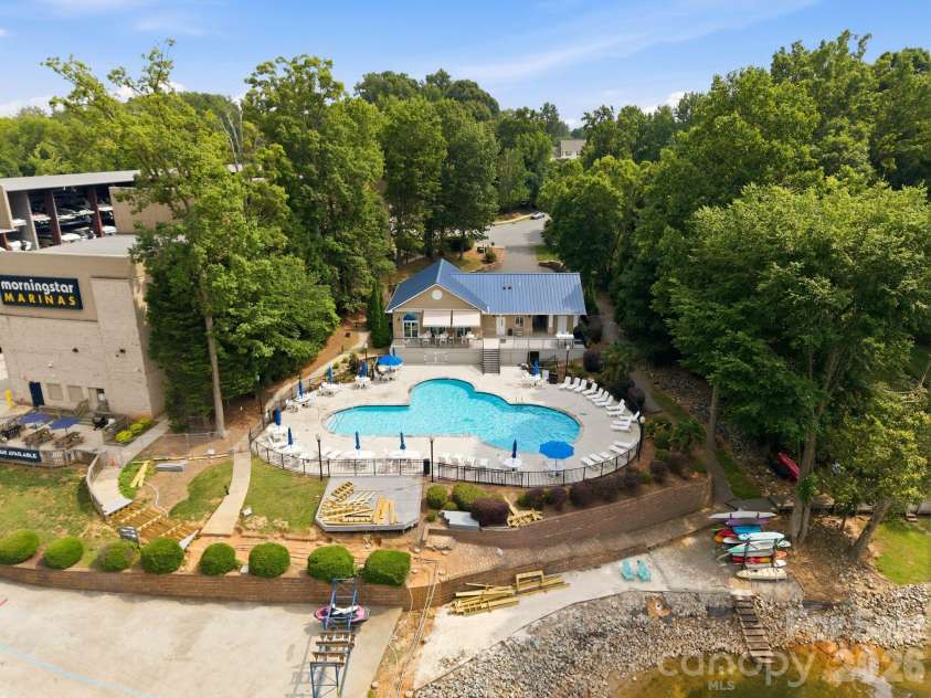 21311 Crown Lake Drive, Cornelius, NC 28031.  MLS# CAR4387375, YatesRealty ID 33569. Lakefront Pool