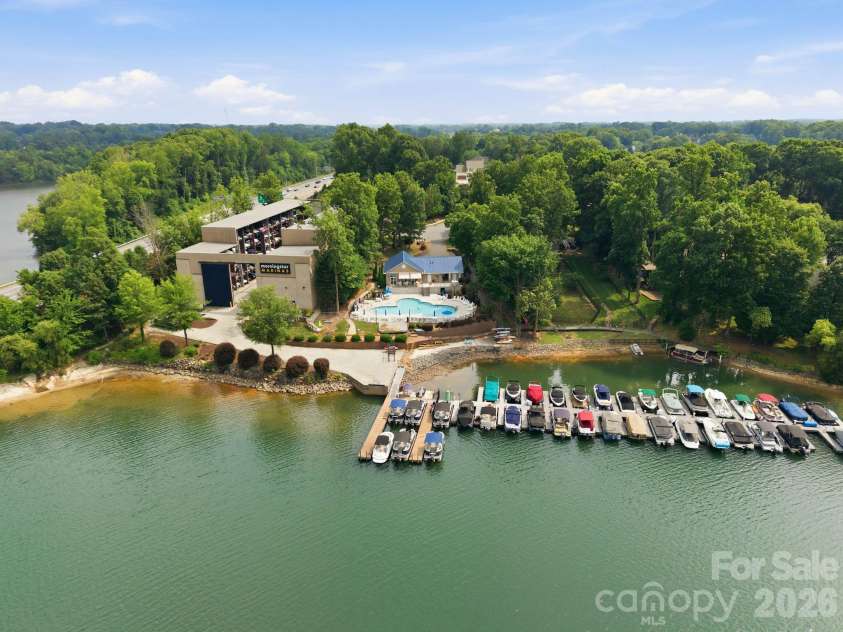 21311 Crown Lake Drive, Cornelius, NC 28031.  MLS# CAR4387375, YatesRealty ID 33569. Lakefront Pool