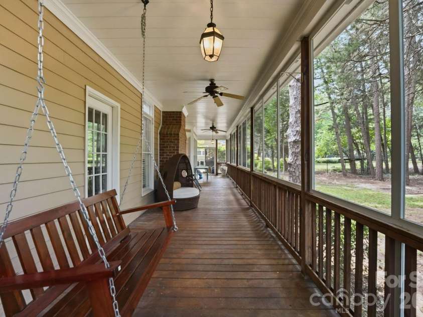 21311 Crown Lake Drive, Cornelius, NC 28031.  MLS# CAR4387375, YatesRealty ID 33569. Relax on the Back Porch