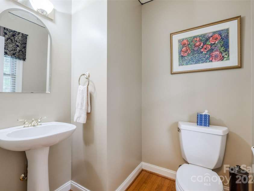 14232 Kendalton Meadow Drive, Mint Hill, NC 28227.  MLS# CAR4198658, YatesRealty ID 3357. Downstairs Half Bath