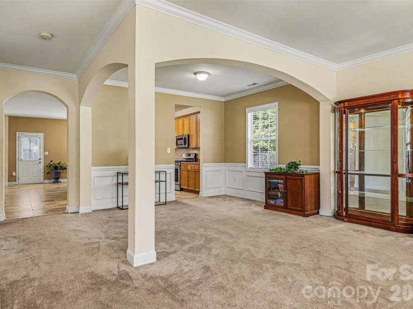 3035 Proverbs Court, Monroe, NC 28110.  MLS# CAR4391682, YatesRealty ID 33570. Living Room/Dining Room