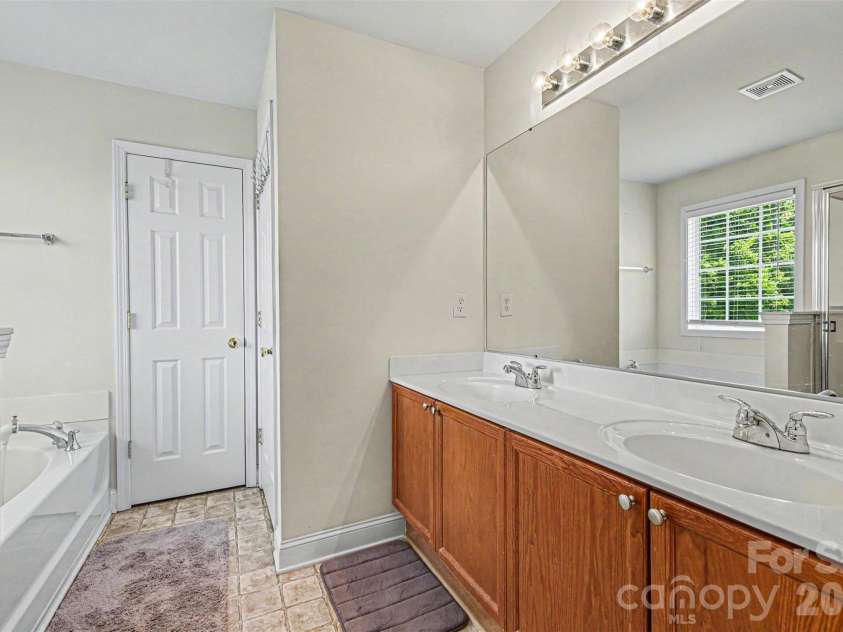3035 Proverbs Court, Monroe, NC 28110.  MLS# CAR4391682, YatesRealty ID 33570. Primary Bathroom