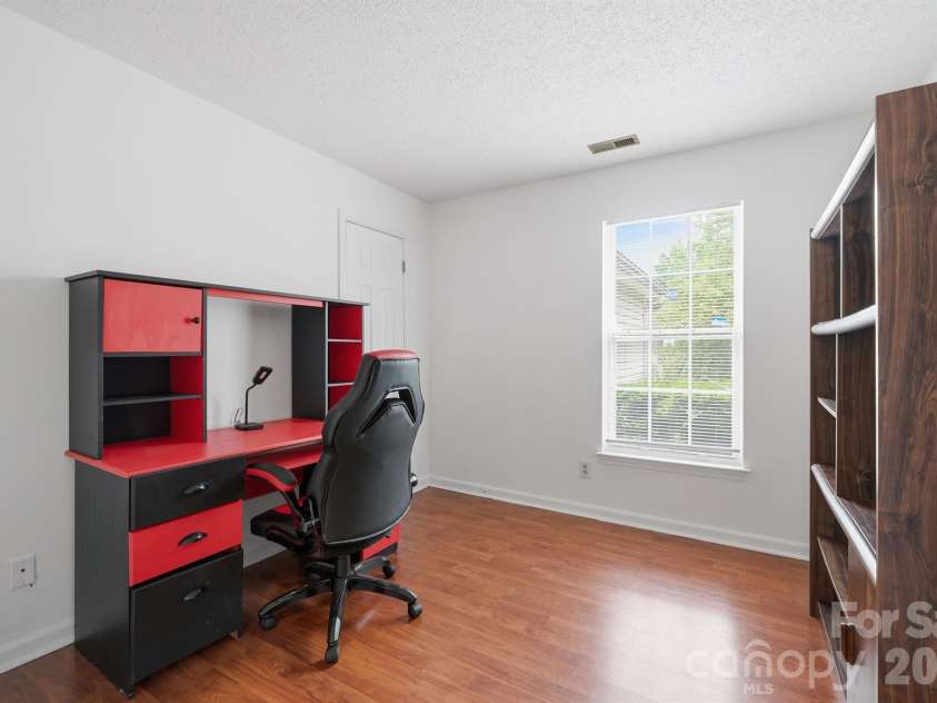 9426 Cantle Drive, Charlotte, NC 28216.  MLS# CAR4385607, YatesRealty ID 33571. Bedroom 2/officewith solid double doors