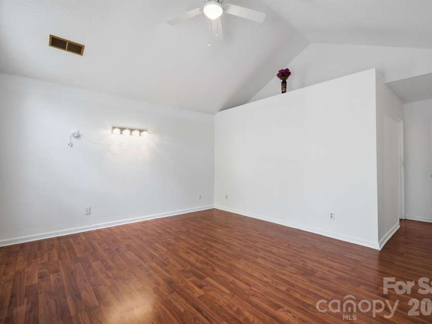 9426 Cantle Drive, Charlotte, NC 28216.  MLS# CAR4385607, YatesRealty ID 33571. Primary Bedroom vaulted ceilings