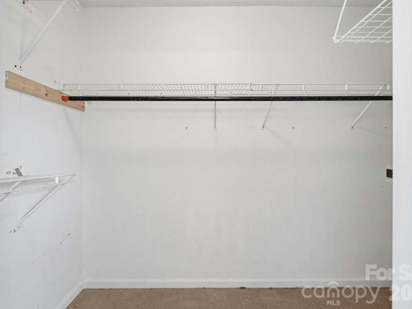 9426 Cantle Drive, Charlotte, NC 28216.  MLS# CAR4385607, YatesRealty ID 33571. Walk in closet in Primary