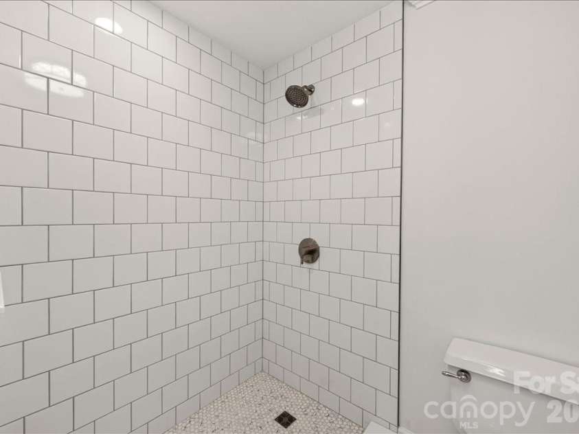 6912 Foxglove Drive, Charlotte, NC 28226.  MLS# CAR4394757, YatesRealty ID 33579. Large tiled shower