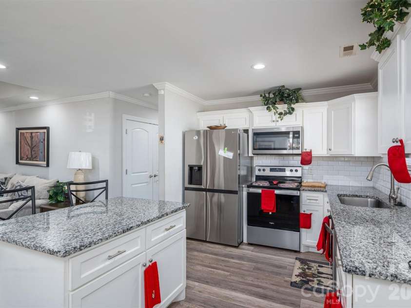 505 Cloninger Street, Dallas, NC 28034.  MLS# CAR4342350, YatesRealty ID 3358. Kitchen Island.  Appliances convey other than refrigerator.