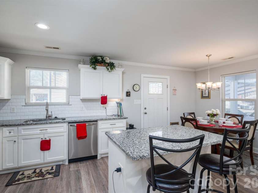 505 Cloninger Street, Dallas, NC 28034.  MLS# CAR4342350, YatesRealty ID 3358. Kitchen Island with bar area.
