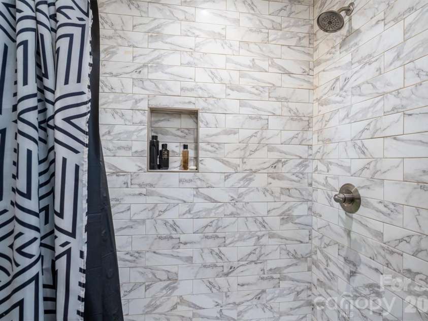 505 Cloninger Street, Dallas, NC 28034.  MLS# CAR4342350, YatesRealty ID 3358. Primary bath shower