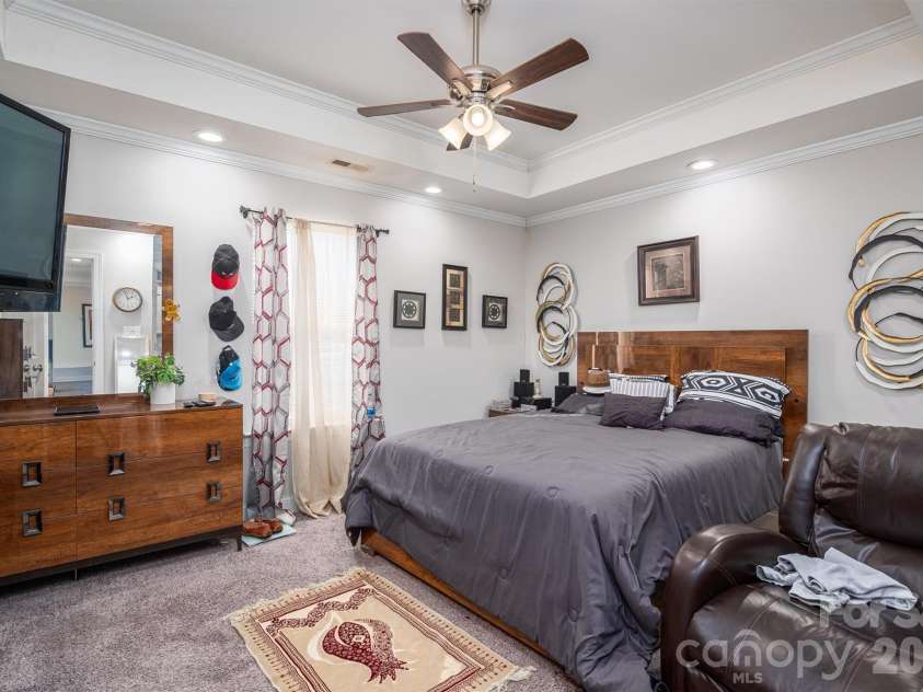 505 Cloninger Street, Dallas, NC 28034.  MLS# CAR4342350, YatesRealty ID 3358. Primary Bedroom with ensuite bath.