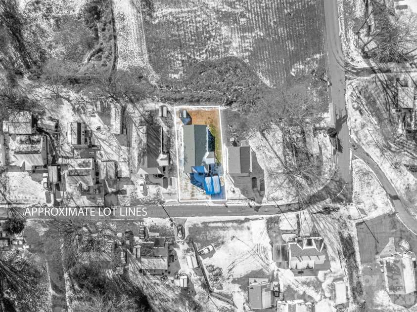505 Cloninger Street, Dallas, NC 28034.  MLS# CAR4342350, YatesRealty ID 3358. Snowy view from the sky.  Nice rectangular lot